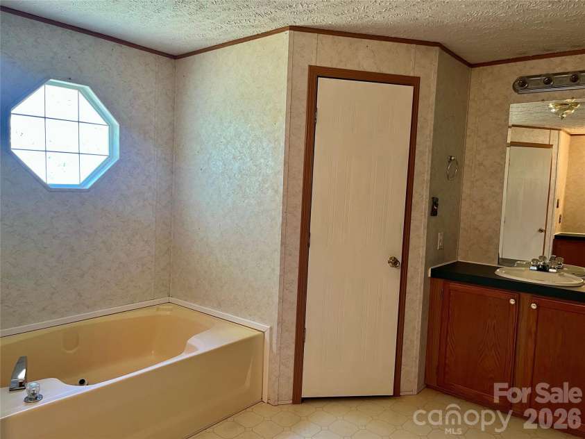 2395 Mount Home Church Road, Morganton, NC 28655.  MLS# CAR4401550, YatesRealty ID 35572. Primary Bath