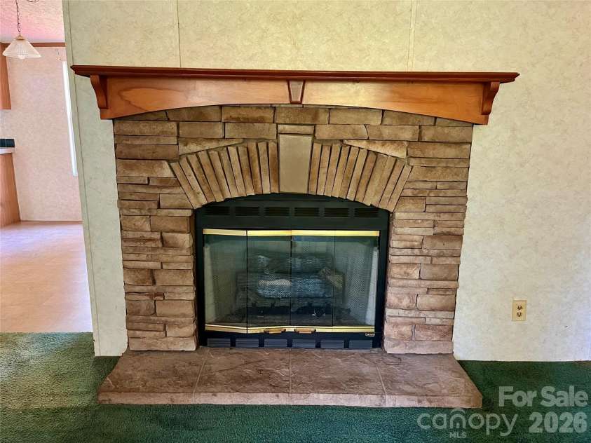 2395 Mount Home Church Road, Morganton, NC 28655.  MLS# CAR4401550, YatesRealty ID 35572. Stone Propane FP
