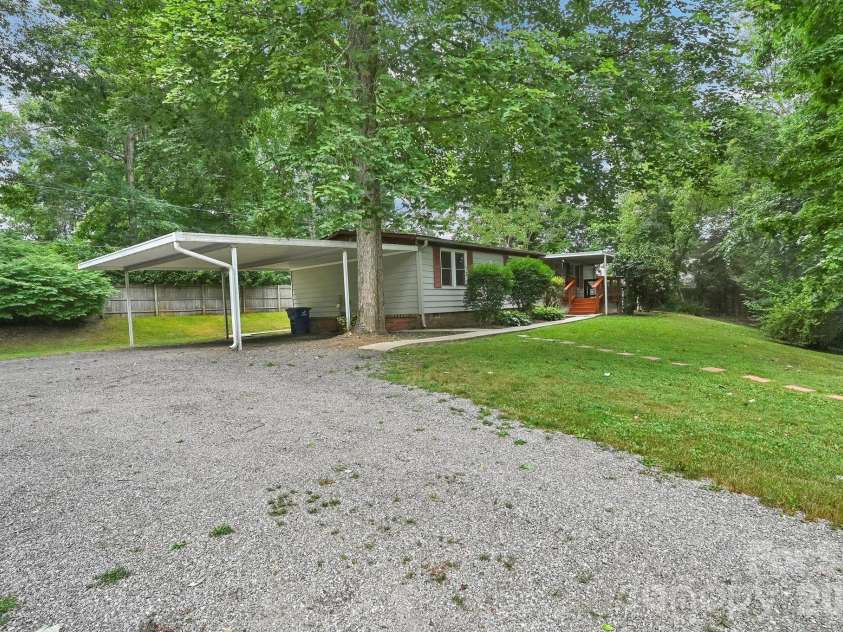 10 Canyon Cove, Candler, NC 28715.  MLS# CAR4400495, YatesRealty ID 35575. Circular Driveway and Attached Carport