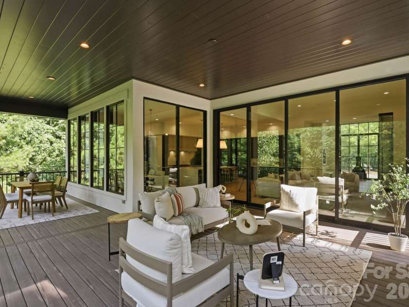 13703 Grand Palisades Parkway, Charlotte, NC 28278.  MLS# CAR4400454, YatesRealty ID 35576. Main level covered patio