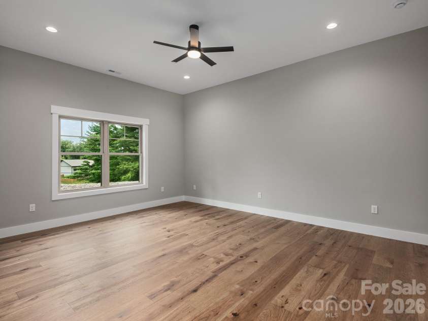 105 Sheila Wynne Drive, Hendersonville, NC 28732.  MLS# CAR4394668, YatesRealty ID 35580. Lower level bedroom