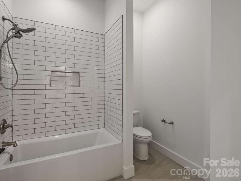 105 Sheila Wynne Drive, Hendersonville, NC 28732.  MLS# CAR4394668, YatesRealty ID 35580. Lower level full bathroom