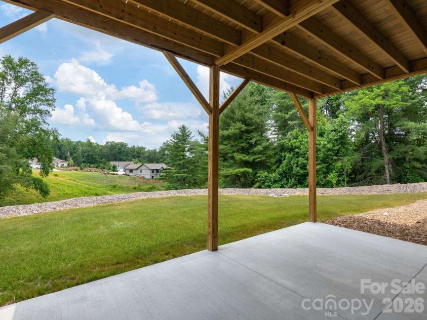 105 Sheila Wynne Drive, Hendersonville, NC 28732.  MLS# CAR4394668, YatesRealty ID 35580. Lower level patio
