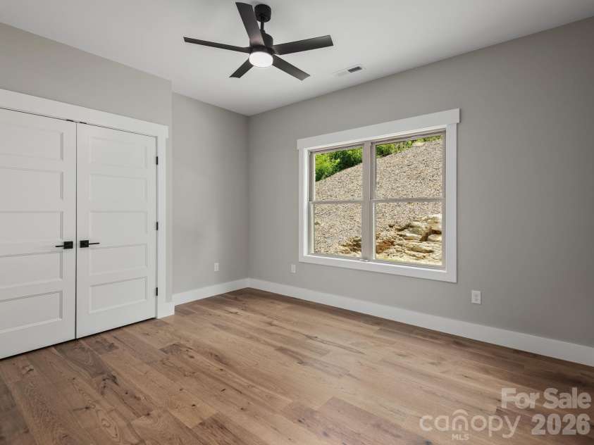 105 Sheila Wynne Drive, Hendersonville, NC 28732.  MLS# CAR4394668, YatesRealty ID 35580. Main level 2nd bedroom