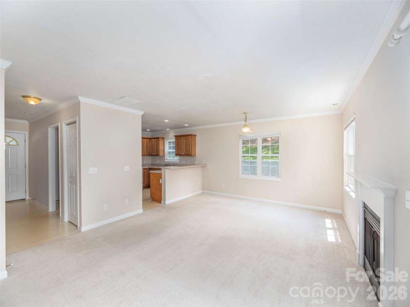 1 Willoughby Run Drive, Asheville, NC 28803.  MLS# CAR4400117, YatesRealty ID 35583. Looking towards the Entry and Kitchen through the Great Room