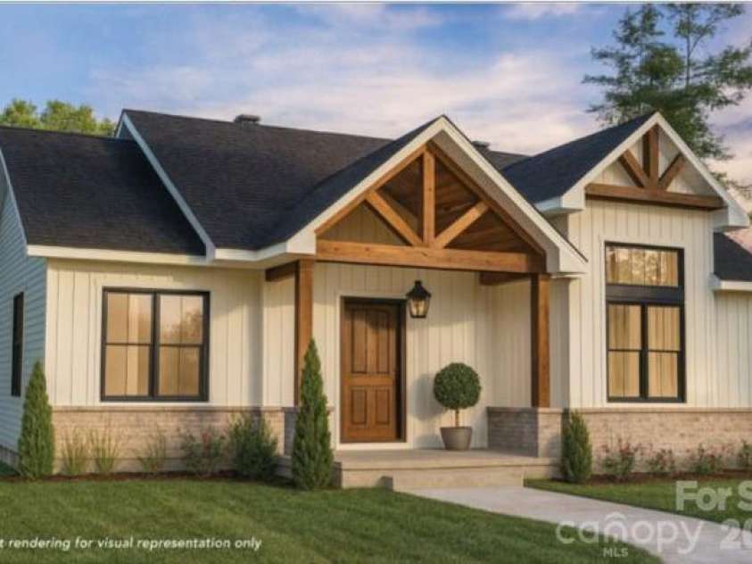 356 Main Street, McAdenville, NC 28101.  MLS# CAR4315707, YatesRealty ID 3559. Beautifully crafted exterior with wood beam accents and oversized windows, creating a bright, inviting presence from the moment you arrive