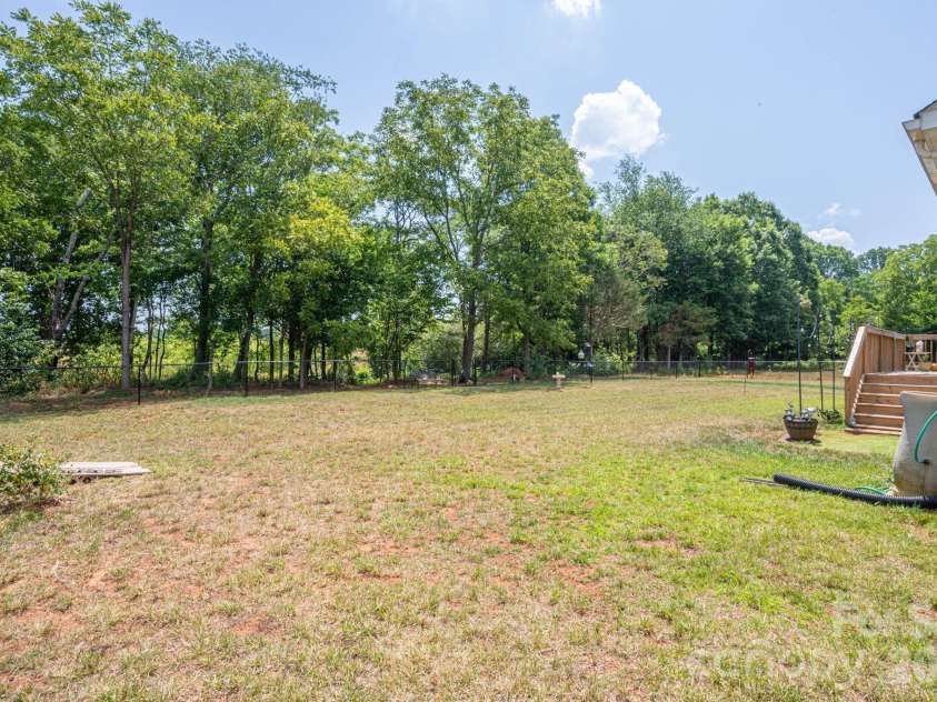 4164 Olivers Cross Road, Newton, NC 28658.  MLS# CAR4401217, YatesRealty ID 35597. Large fenced backyard
