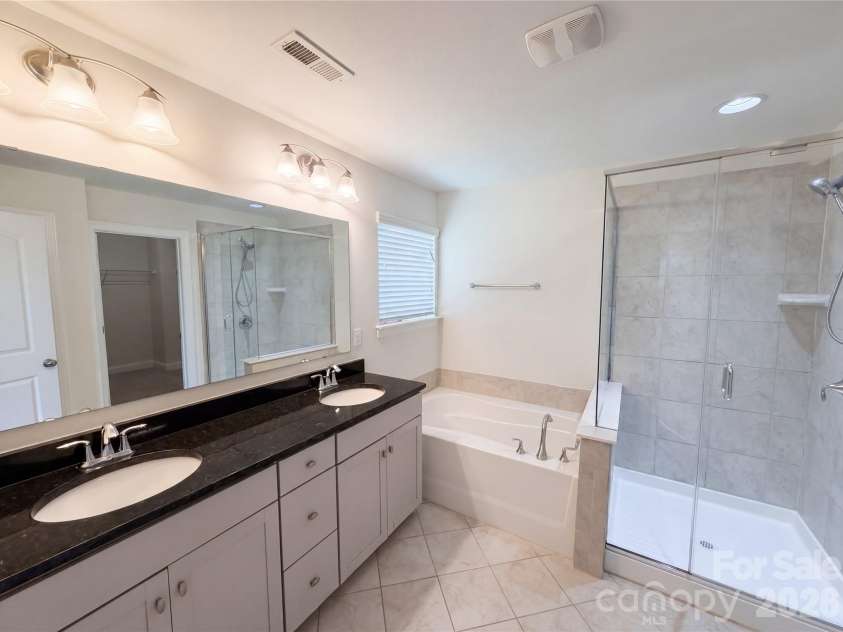 1908 Cantrell Court, Matthews, NC 28104.  MLS# CAR4401557, YatesRealty ID 35619. Primary bathroom with water closet