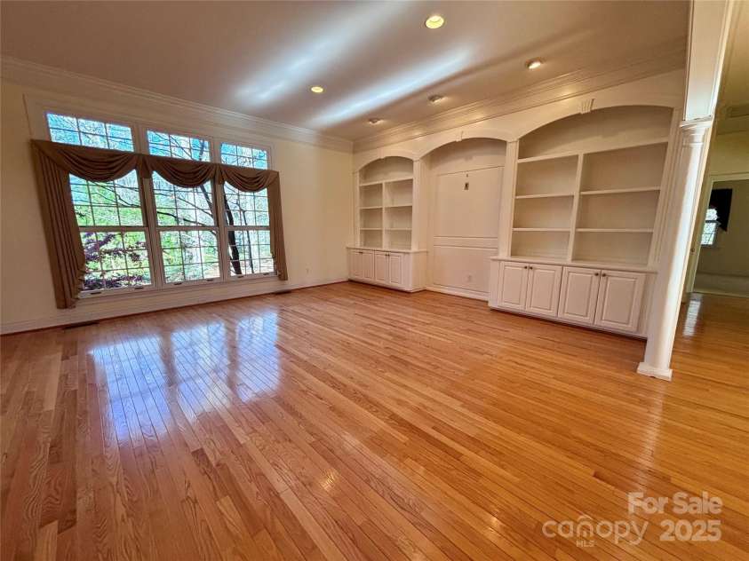 1419 Ridge Street, Albemarle, NC 28001.  MLS# CAR4236002, YatesRealty ID 3562. Living room with beautiful hardwood floors and built ins