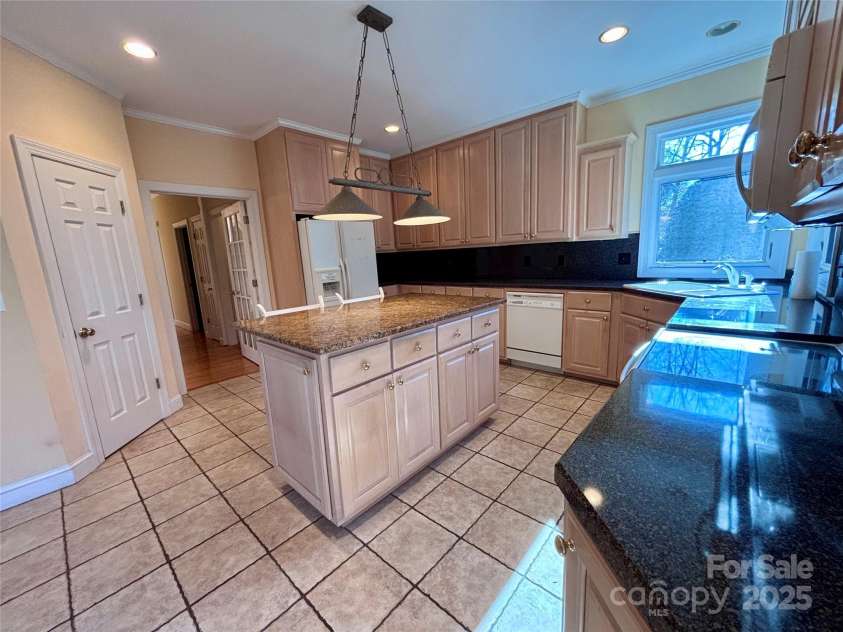 1419 Ridge Street, Albemarle, NC 28001.  MLS# CAR4236002, YatesRealty ID 3562. Nice kitchen with island bar and pantry