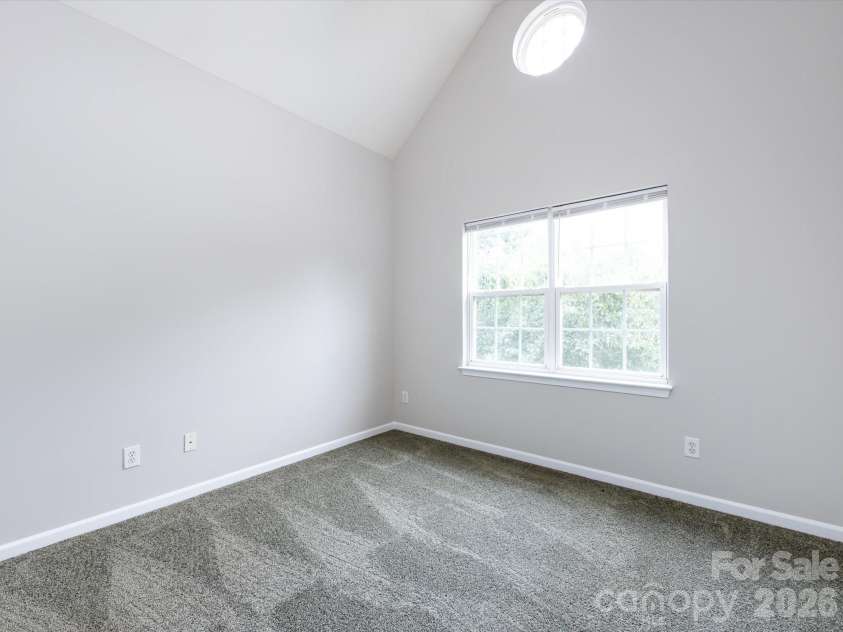 1423 Piper Court, Concord, NC 28025.  MLS# CAR4376412, YatesRealty ID 35626. Bedroom 4 with vaulted ceiling