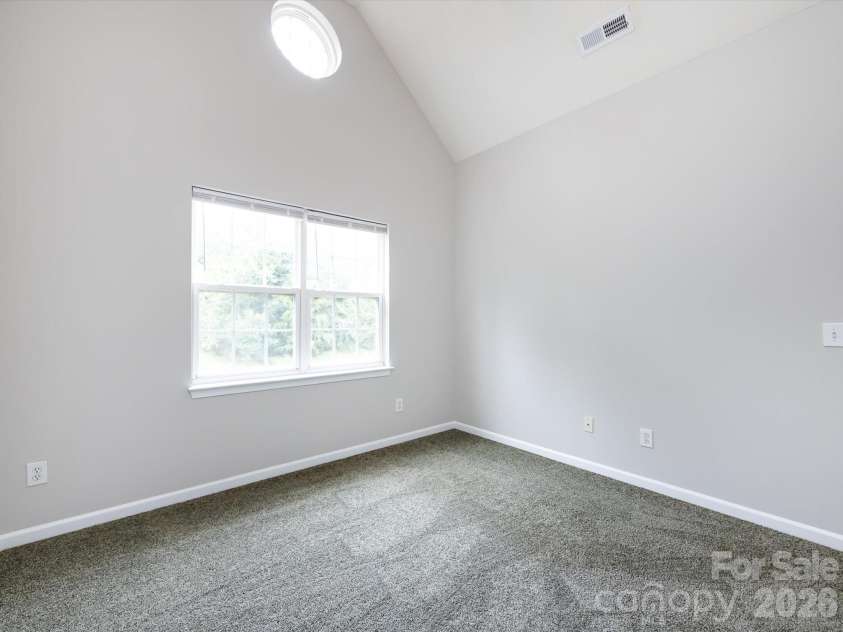 1423 Piper Court, Concord, NC 28025.  MLS# CAR4376412, YatesRealty ID 35626. Bedroom 4 with vaulted ceiling