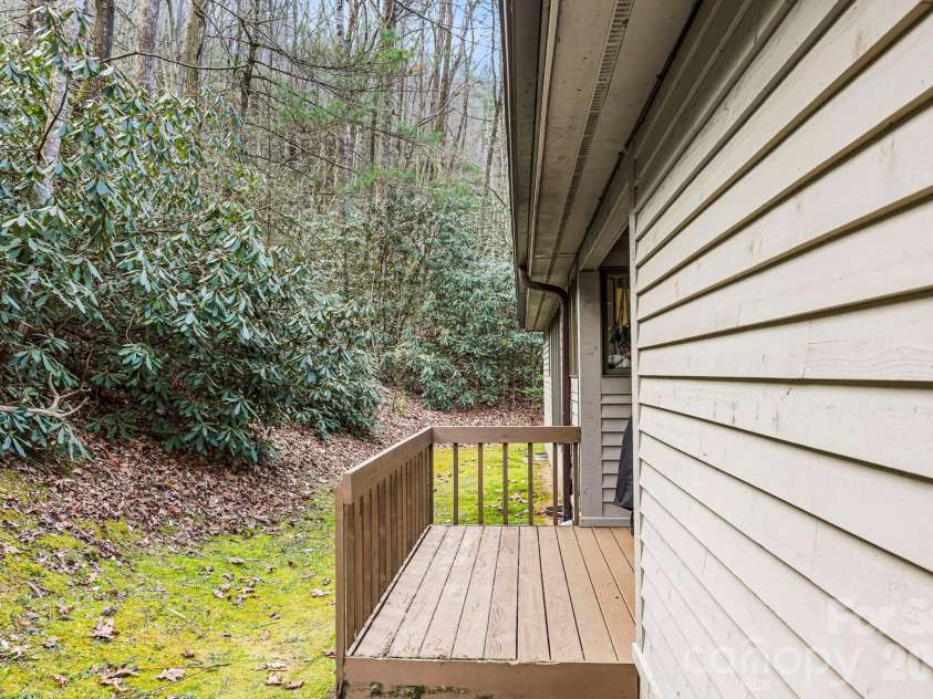 446 Silver Fox Lane, Pisgah Forest, NC 28768.  MLS# CAR4360860, YatesRealty ID 35629. Covered Back Deck
