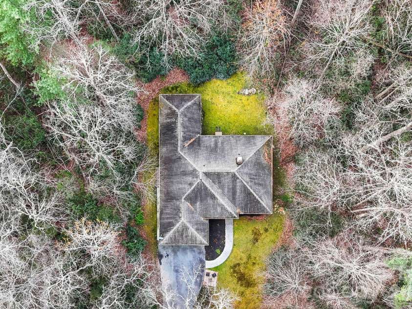 446 Silver Fox Lane, Pisgah Forest, NC 28768.  MLS# CAR4360860, YatesRealty ID 35629. Drone: Property Overhead