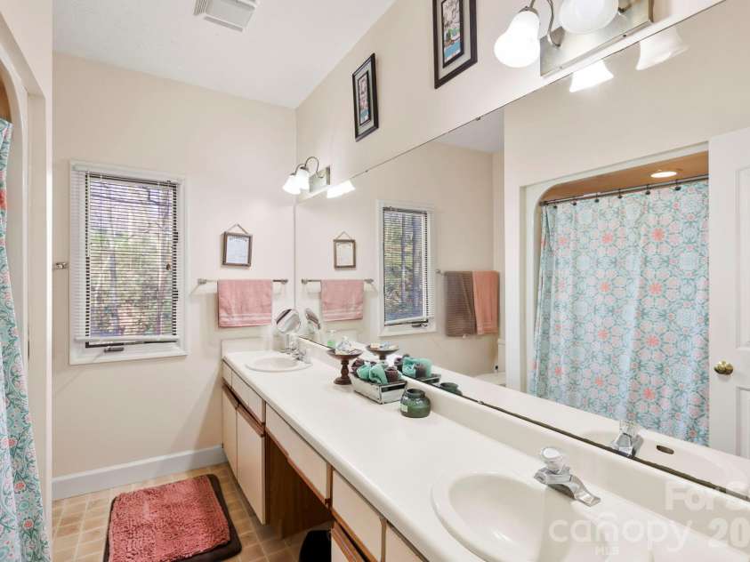 446 Silver Fox Lane, Pisgah Forest, NC 28768.  MLS# CAR4360860, YatesRealty ID 35629. Guest Bathroom