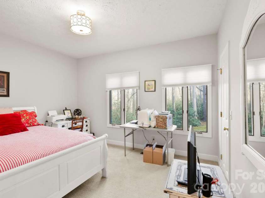 446 Silver Fox Lane, Pisgah Forest, NC 28768.  MLS# CAR4360860, YatesRealty ID 35629. Guest Bedroom 1: Split Bedroom Floorplan