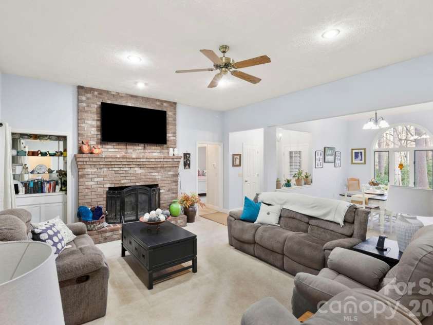 446 Silver Fox Lane, Pisgah Forest, NC 28768.  MLS# CAR4360860, YatesRealty ID 35629. Large Windows & Fireplace