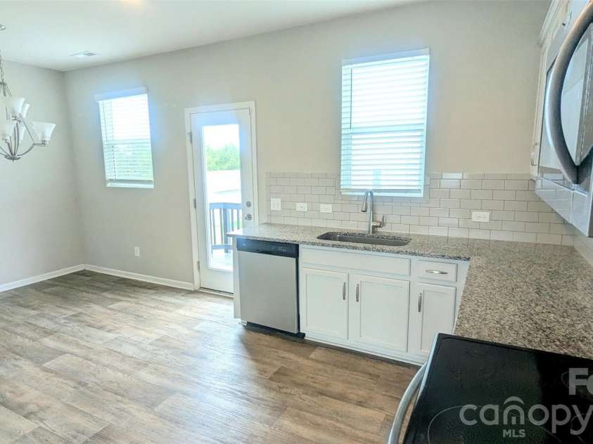 12417 Bryton Ridge Parkway, Huntersville, NC 28078.  MLS# CAR4401551, YatesRealty ID 3563. Kitchen from Back door view