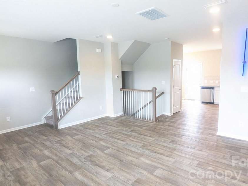 12417 Bryton Ridge Parkway, Huntersville, NC 28078.  MLS# CAR4401551, YatesRealty ID 3563. View From Front Corner of Living Room to Back of the home