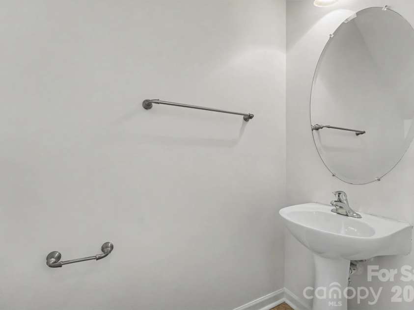 107 Arcadian Way, Mooresville, NC 28117.  MLS# CAR4394549, YatesRealty ID 35635. Half bath room on main level