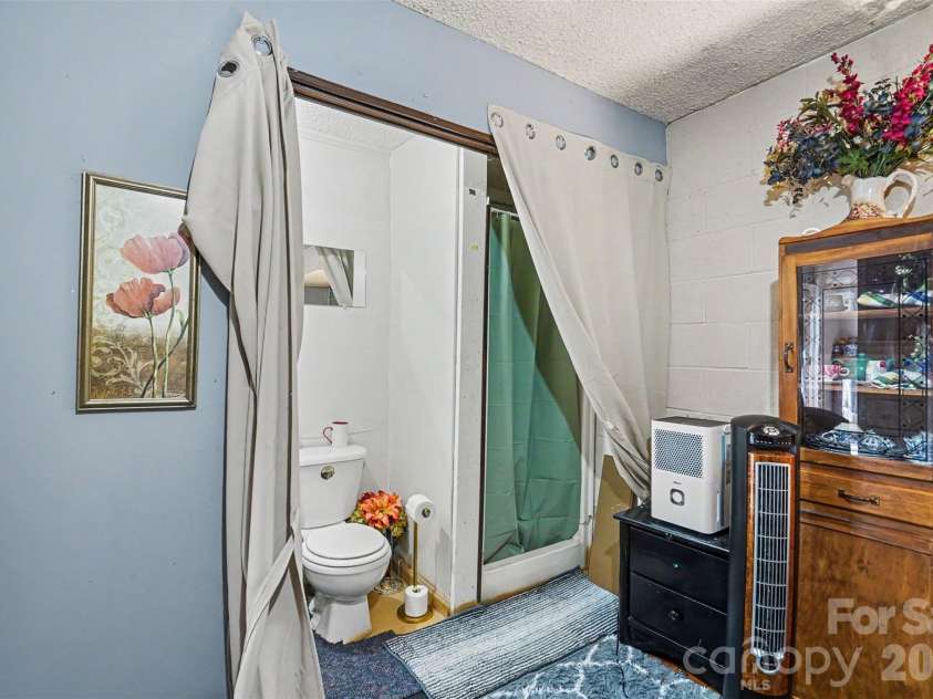 7707 Waxhaw Highway, Waxhaw, NC 28173.  MLS# CAR4401660, YatesRealty ID 35665. Basement bathroom