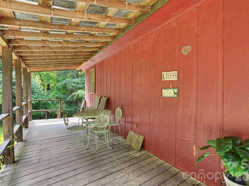 7707 Waxhaw Highway, Waxhaw, NC 28173.  MLS# CAR4401660, YatesRealty ID 35665. Covered back porch