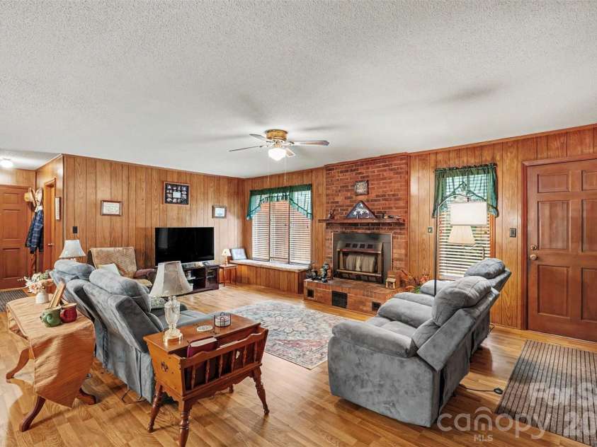 7707 Waxhaw Highway, Waxhaw, NC 28173.  MLS# CAR4401660, YatesRealty ID 35665. Cozy living room