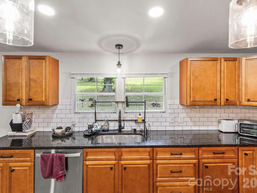 4265 Dry Pond Lane, Conover, NC 28613.  MLS# CAR4396128, YatesRealty ID 35668. Kitchen view - includes refrigerator and microwave range, dish washer stainless steel