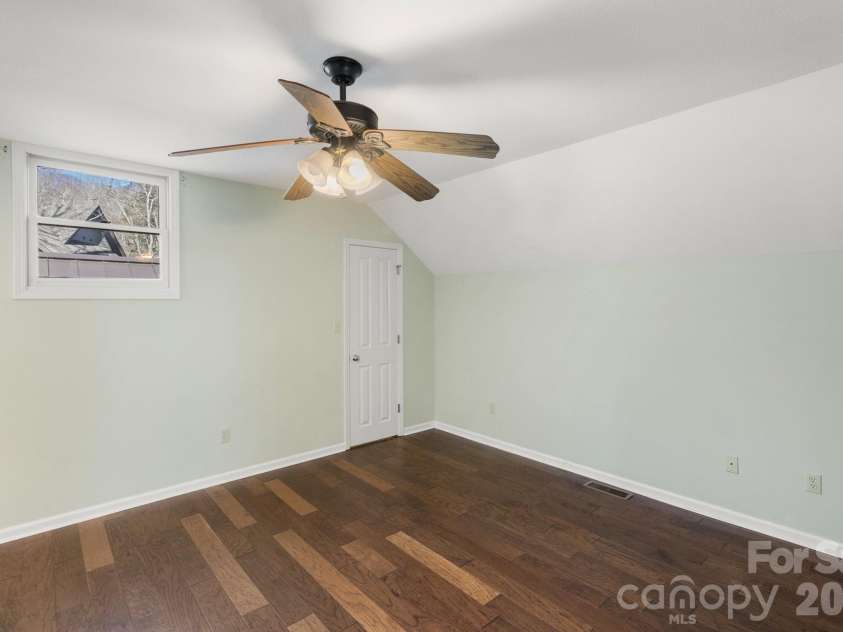 451 Crescent Trail, Highlands, NC 28741.  MLS# CAR4342214, YatesRealty ID 3567. Ensuite Guest Room on the Upper Level