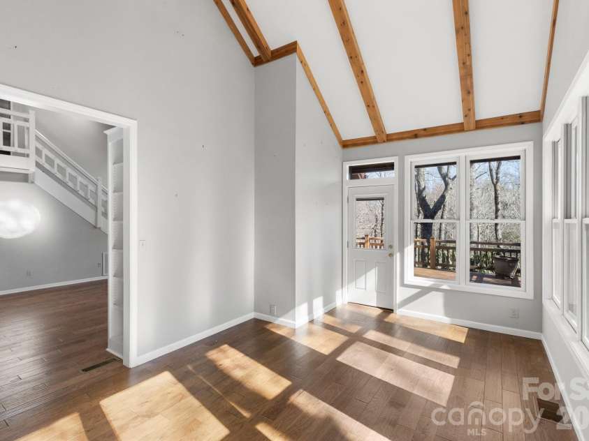 451 Crescent Trail, Highlands, NC 28741.  MLS# CAR4342214, YatesRealty ID 3567. Formal Dining Room (and door out to back deck)