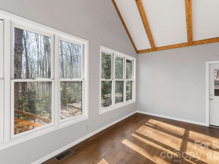 451 Crescent Trail, Highlands, NC 28741.  MLS# CAR4342214, YatesRealty ID 3567. Formal Dining Room (and door to screened porch)