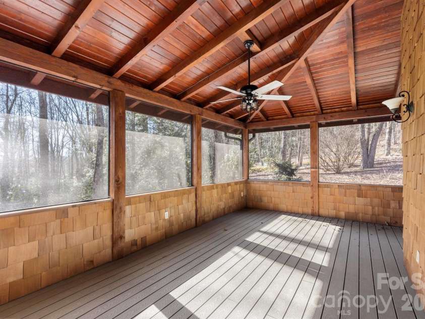 451 Crescent Trail, Highlands, NC 28741.  MLS# CAR4342214, YatesRealty ID 3567. Screened Porch off the Formal Dining Room