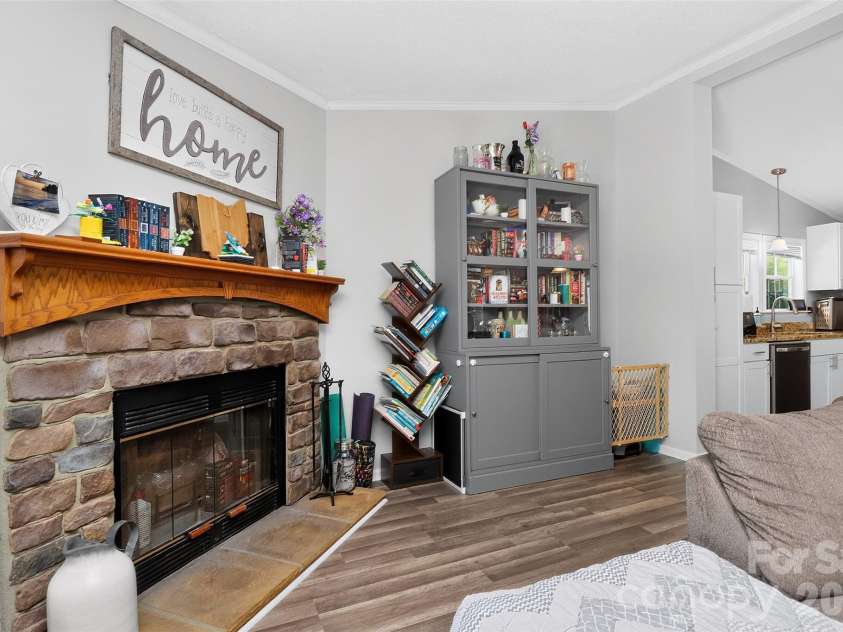 602 Timberwood Drive, Fort Mill, SC 29708.  MLS# CAR4400100, YatesRealty ID 35682. Cozy fireplace