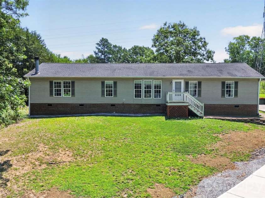 602 Timberwood Drive, Fort Mill, SC 29708.  MLS# CAR4400100, YatesRealty ID 35682. Ranch home situated on over an acre!