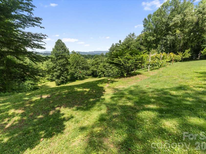293 Sun Meadow Lane, Pisgah Forest, NC 28768.  MLS# CAR4396616, YatesRealty ID 35684. 