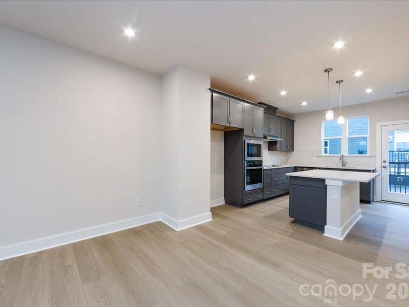 6012 Pivot Court, Charlotte, NC 28205.  MLS# CAR4357047, YatesRealty ID 35686. Dining space and Gourmet Kitchen