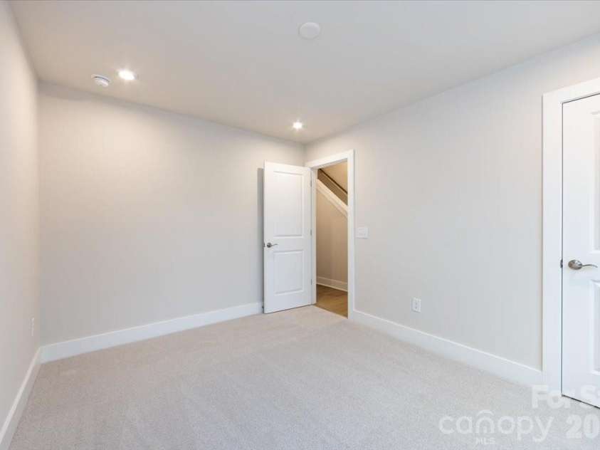 6012 Pivot Court, Charlotte, NC 28205.  MLS# CAR4357047, YatesRealty ID 35686. First floor bedroom