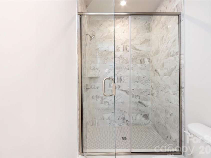 6012 Pivot Court, Charlotte, NC 28205.  MLS# CAR4357047, YatesRealty ID 35686. Primary tiled shower