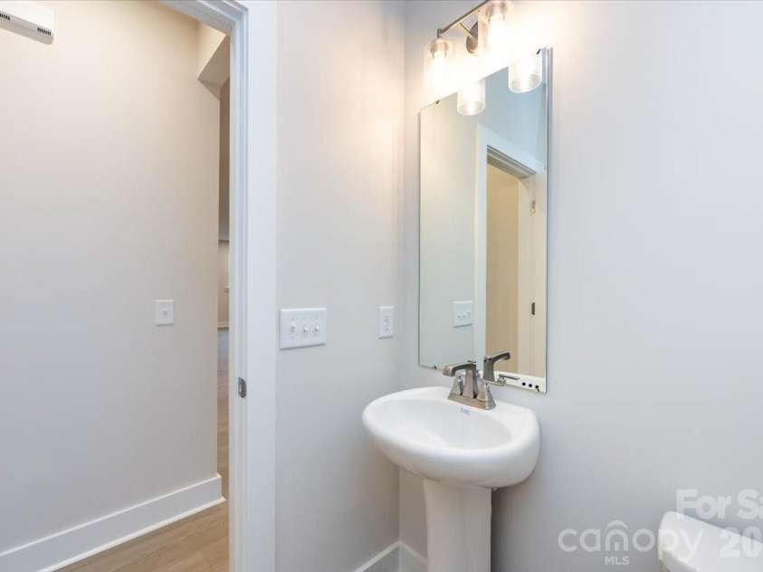 6012 Pivot Court, Charlotte, NC 28205.  MLS# CAR4357047, YatesRealty ID 35686. Second floor powder room