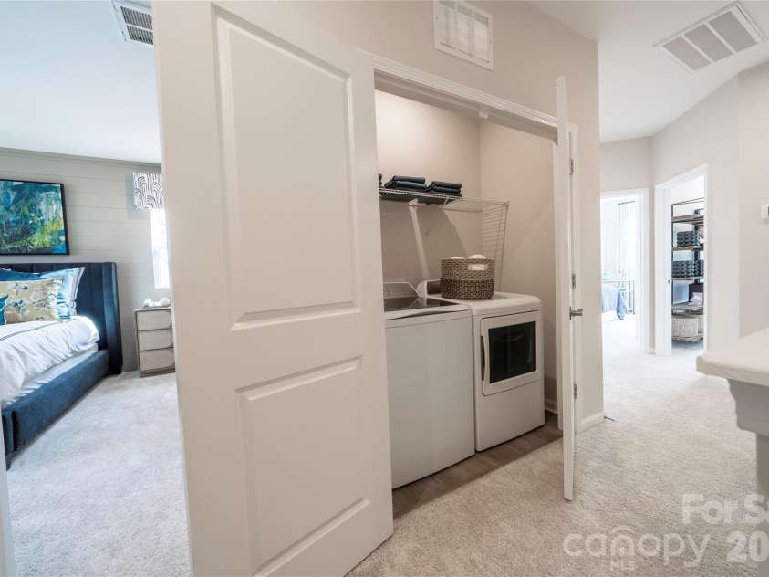 6041 Longar Lane, Charlotte, NC 28269.  MLS# CAR4400027, YatesRealty ID 35687. Second floor laundry closet with washer and dryer included