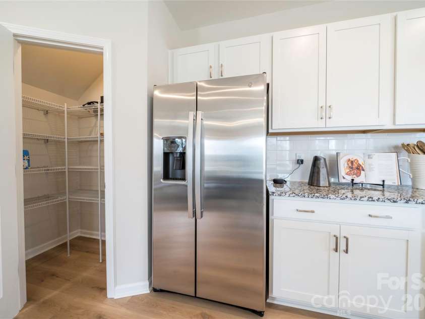 6041 Longar Lane, Charlotte, NC 28269.  MLS# CAR4400027, YatesRealty ID 35687. Walk-in pantry