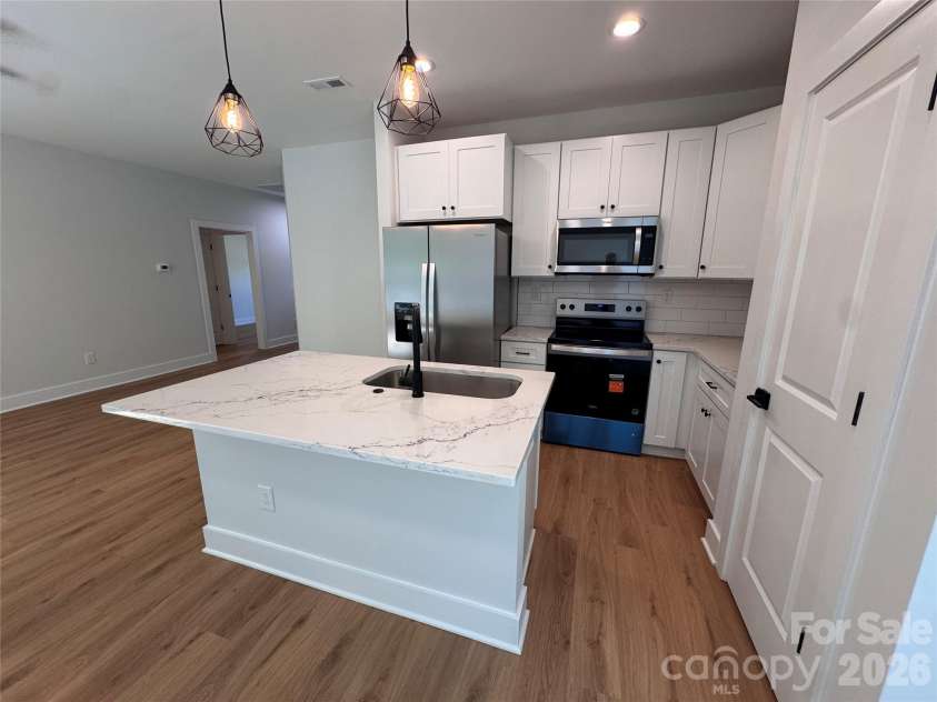 1006 John Street, Monroe, NC 28110.  MLS# CAR4397118, YatesRealty ID 35689. 