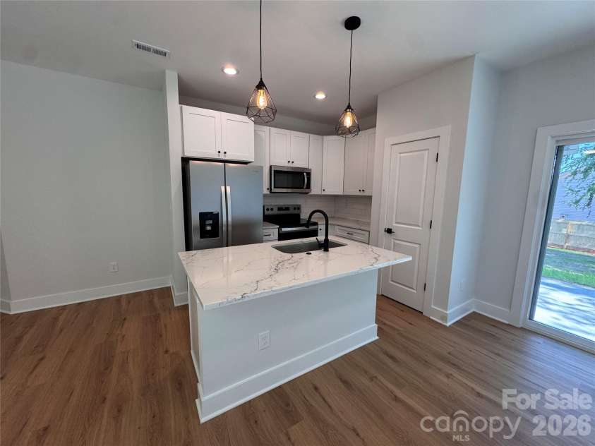 1006 John Street, Monroe, NC 28110.  MLS# CAR4397118, YatesRealty ID 35689. 