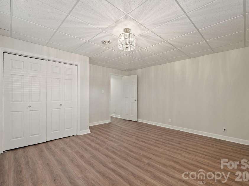 20919 Island Forest Drive, Cornelius, NC 28031.  MLS# CAR4428890, YatesRealty ID 3569. 3rd BR toward closet and hallway
