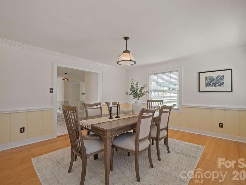 20919 Island Forest Drive, Cornelius, NC 28031.  MLS# CAR4428890, YatesRealty ID 3569. Dining toward the front window and entryway
