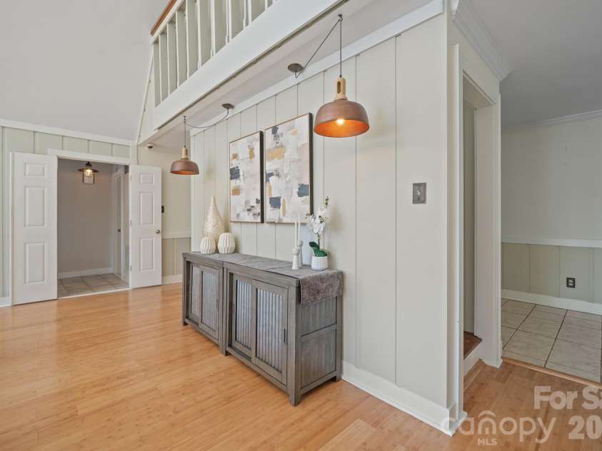 20919 Island Forest Drive, Cornelius, NC 28031.  MLS# CAR4428890, YatesRealty ID 3569. Room for sitting area or credenza as shown here or showcase your favorite artwork