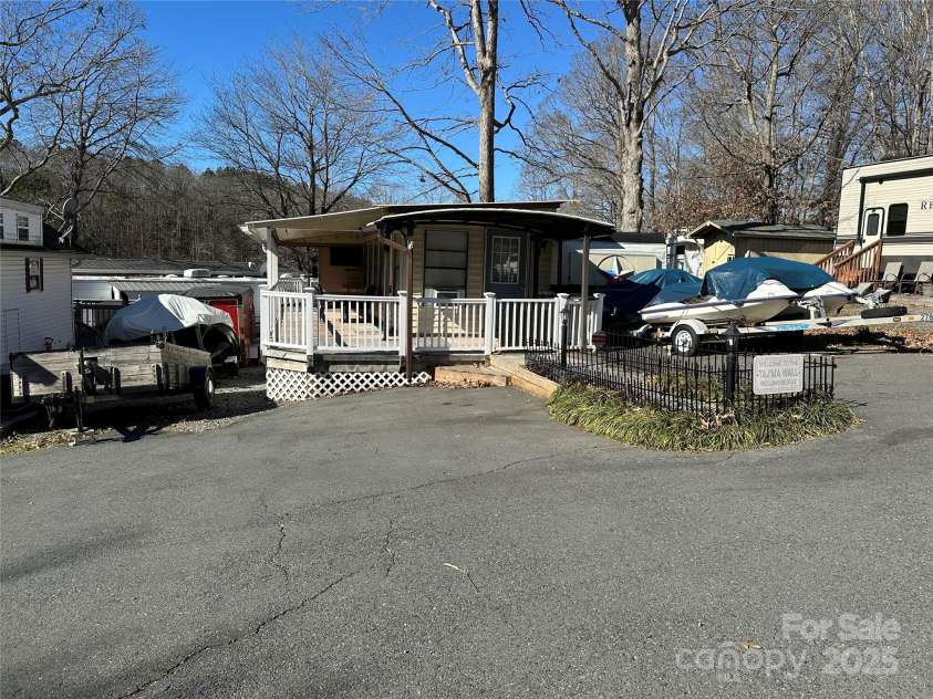 168 Clubhouse Drive, New London, NC 28127.  MLS# CAR4212097, YatesRealty ID 357. 