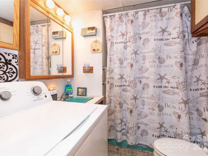 20 A&B Homewood Drive, Asheville, NC 28803.  MLS# CAR4229022, YatesRealty ID 3571. Bathroom in Mobile Home