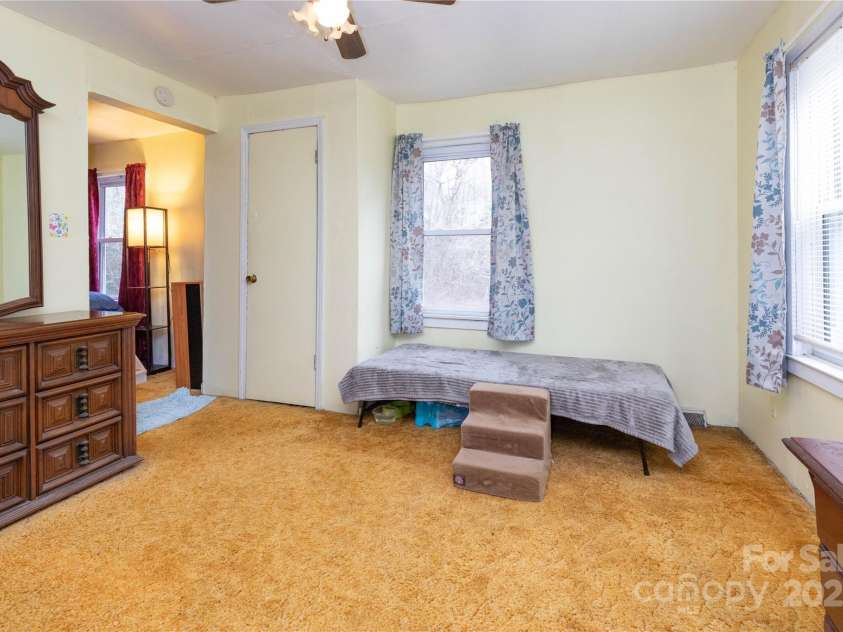 20 A&B Homewood Drive, Asheville, NC 28803.  MLS# CAR4229022, YatesRealty ID 3571. House Bedroom