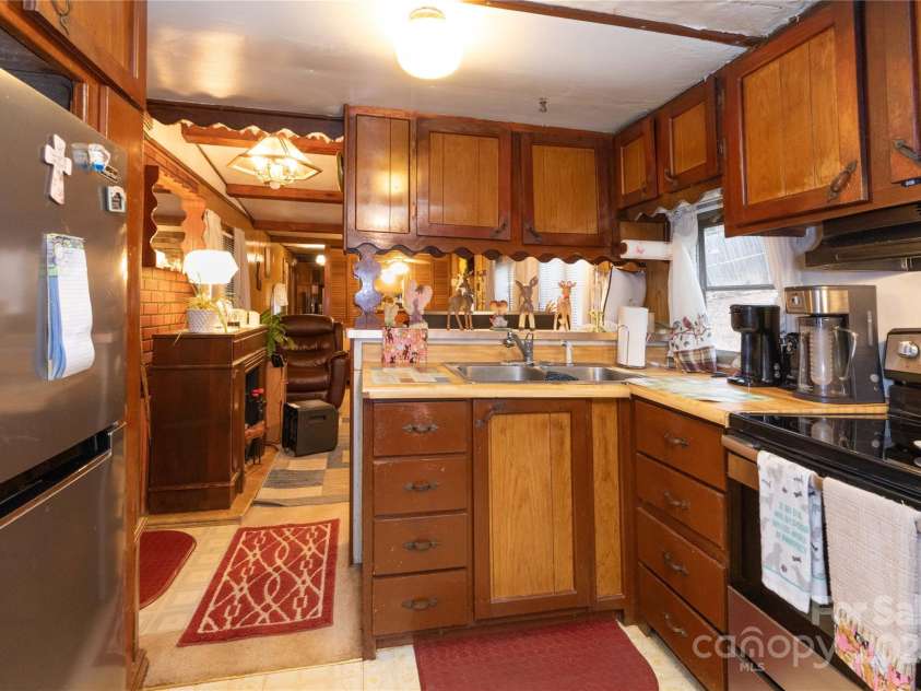 20 A&B Homewood Drive, Asheville, NC 28803.  MLS# CAR4229022, YatesRealty ID 3571. Mobile Home Kitchen